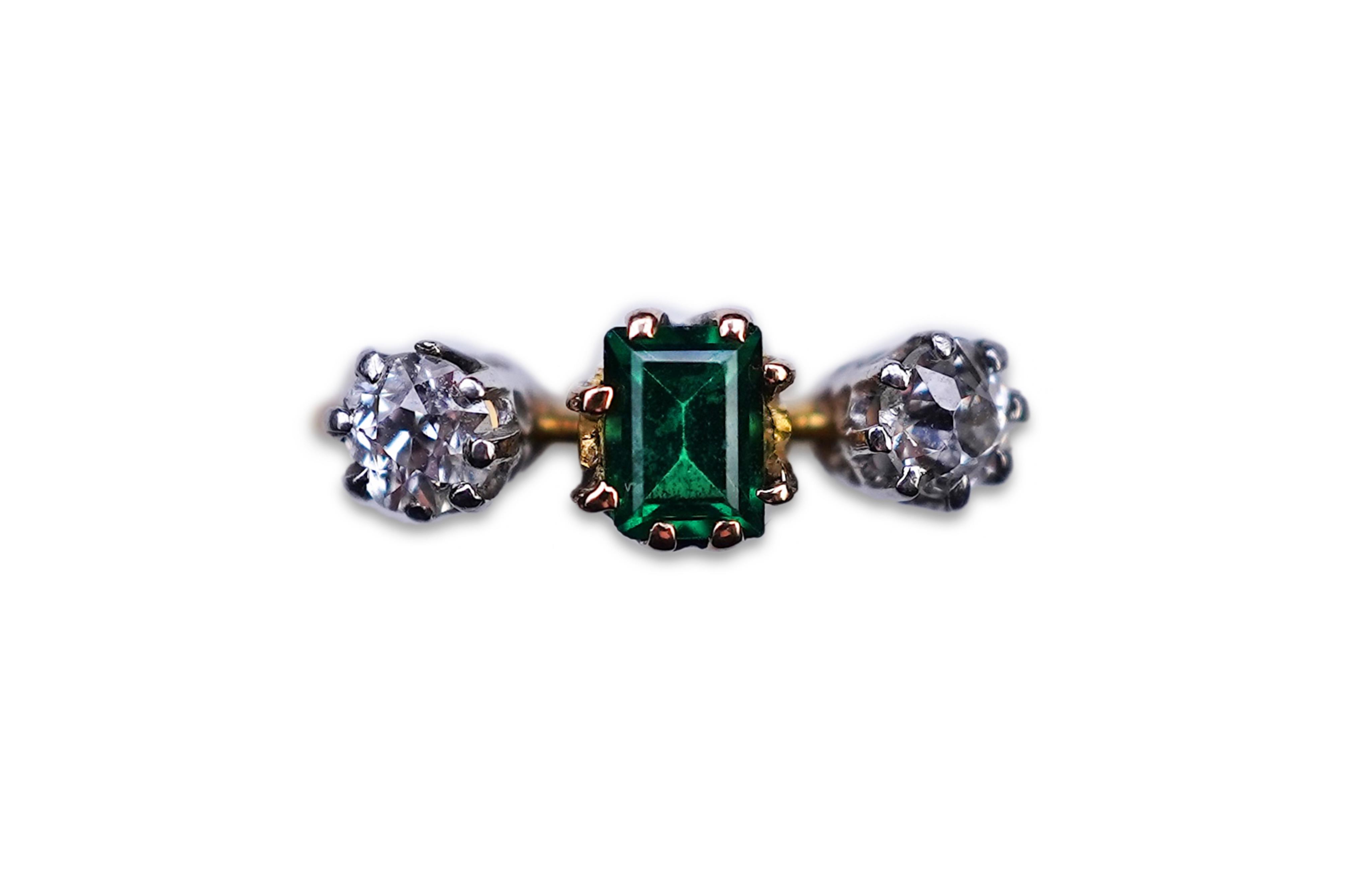 A tsavorite and diamond ring